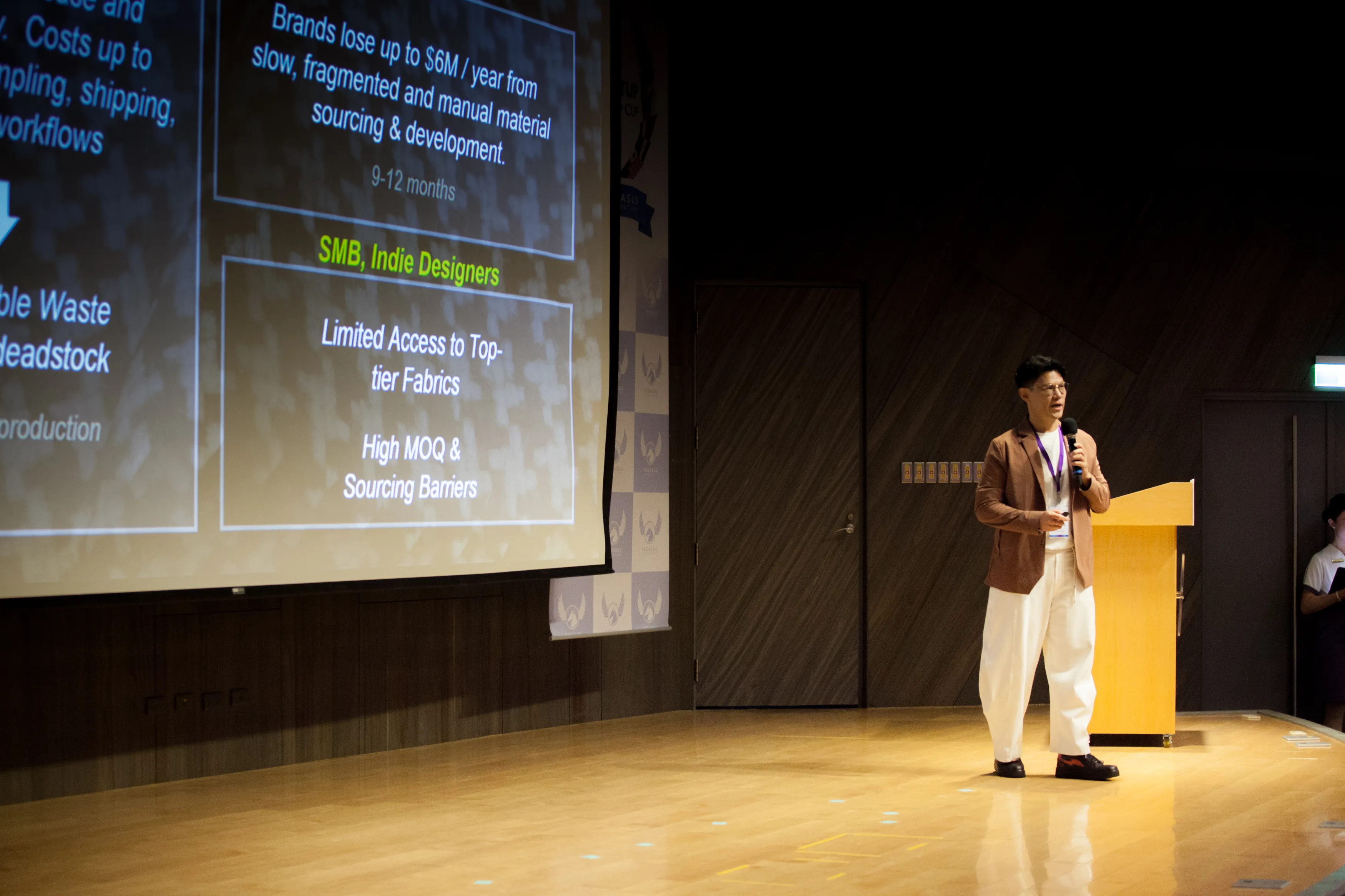 NunoX Founder Jac Hsieh pitching on stage at Startup World Cup Taiwan Hsinchu 2026.
